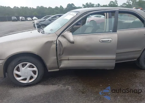 1998 Mazda 626 Dx/Lx из США, поврежденный, VIN 1YVGF22CXW5736434